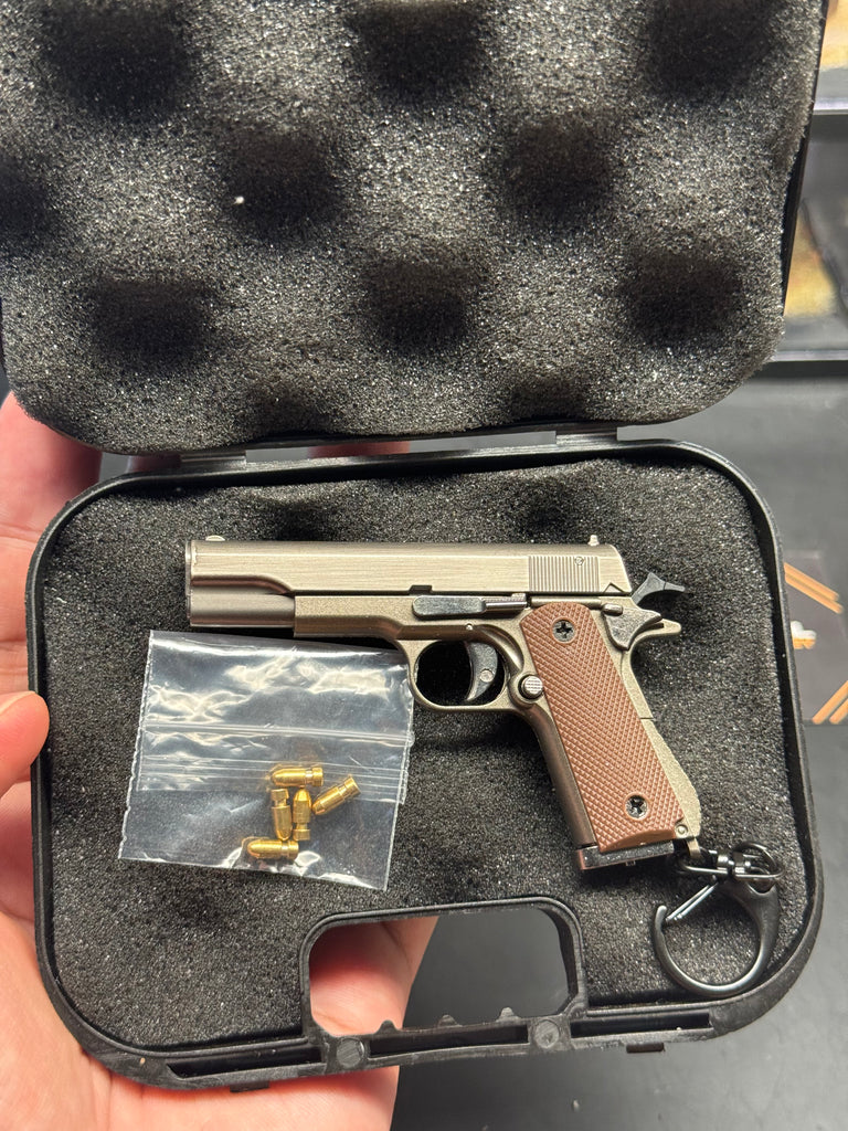 M1911 metal model keychain 1/3 scale gray gunmetal color with bullet ejection function and storage suitcase
