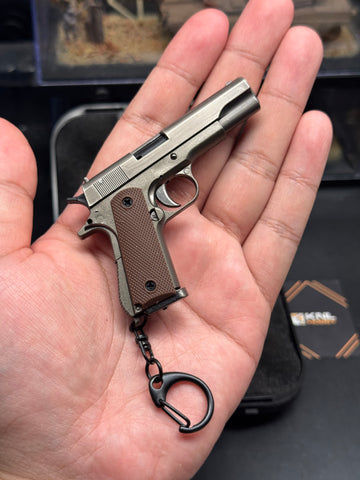 M1911 metal model keychain 1/3 scale gray gunmetal color with bullet ejection function and storage suitcase