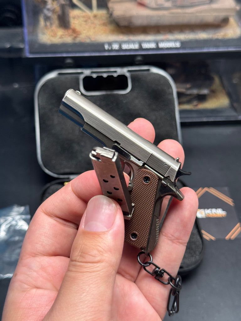 M1911 metal model keychain 1/3 scale gray gunmetal color with bullet ejection function and storage suitcase