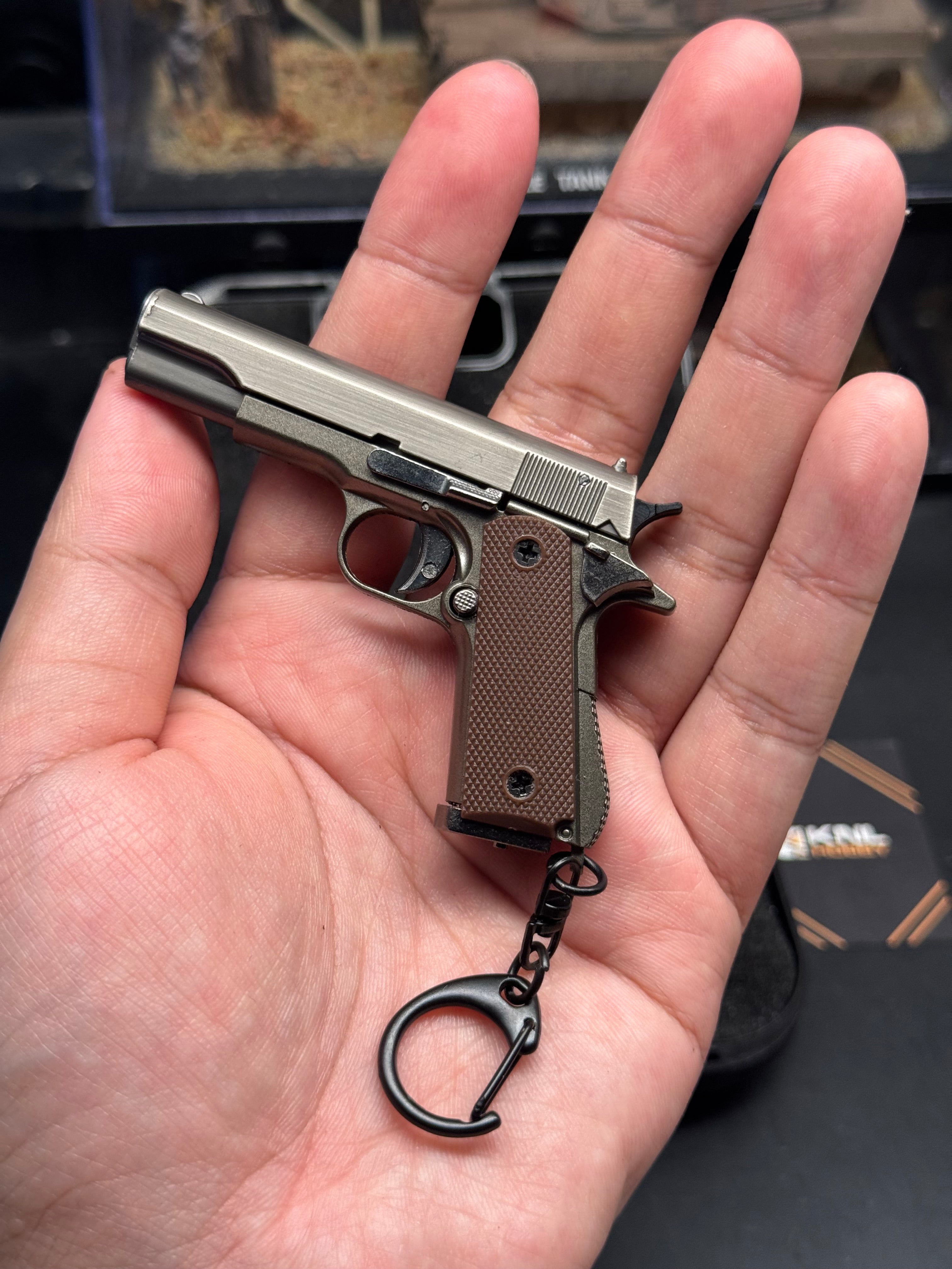 M1911 metal model keychain 1/3 scale gray gunmetal color with bullet ejection function and storage suitcase